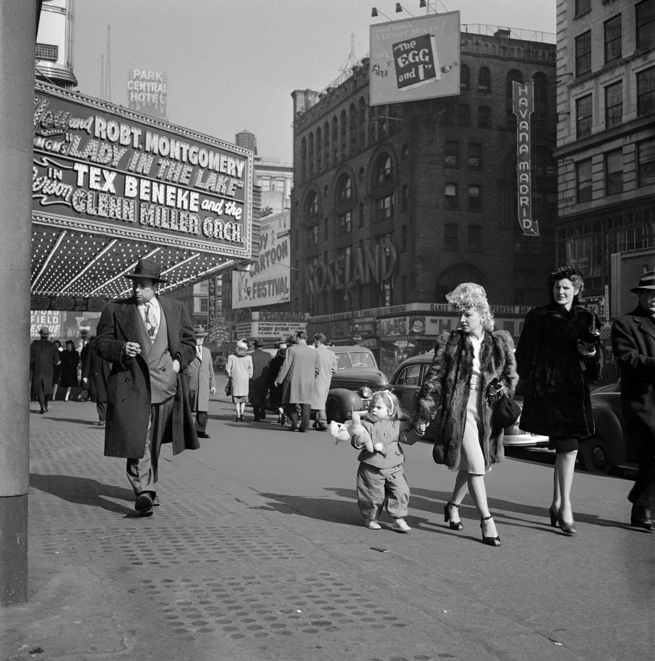 A Woman And A Child Cross 51St Street At The Corner With Broadway, 1947.