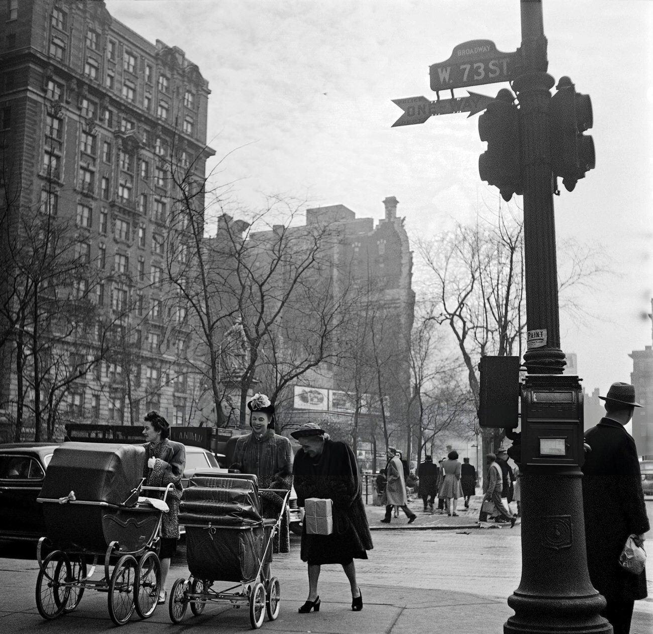 Two Mothers Push Their Baby Buggy Alongside An Old Lady On Broadway, 1947.