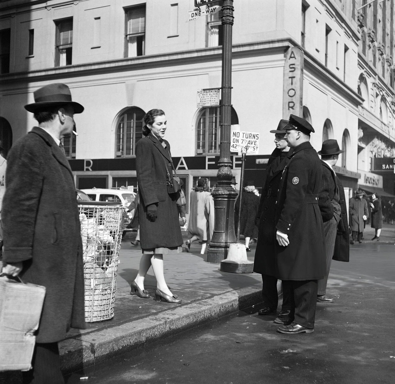 A Policeman Helps A Woman With A Camera Near The Hotel Astor, 1947.