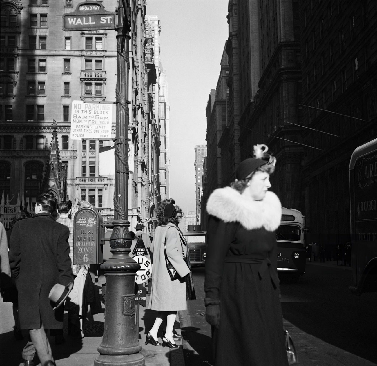 People Walk At The Intersection Of Wall Street And Broadway, 1947.