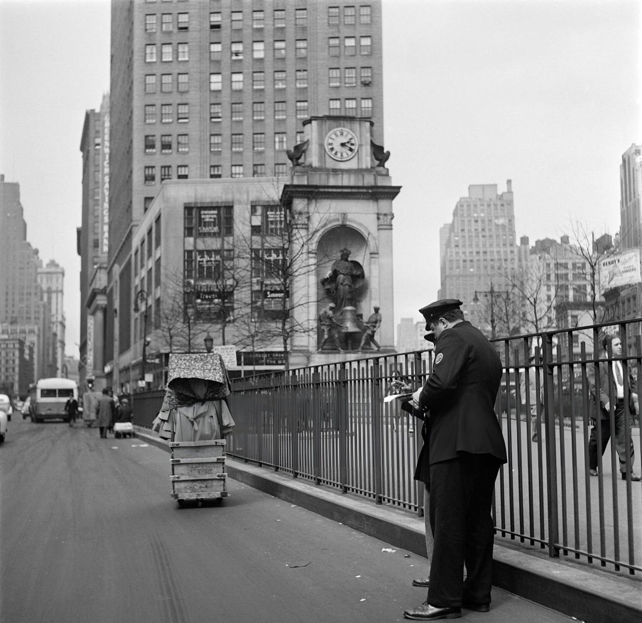 A Policeman Checks The Identity Of A Vagrant Near Herald Square, 1947.