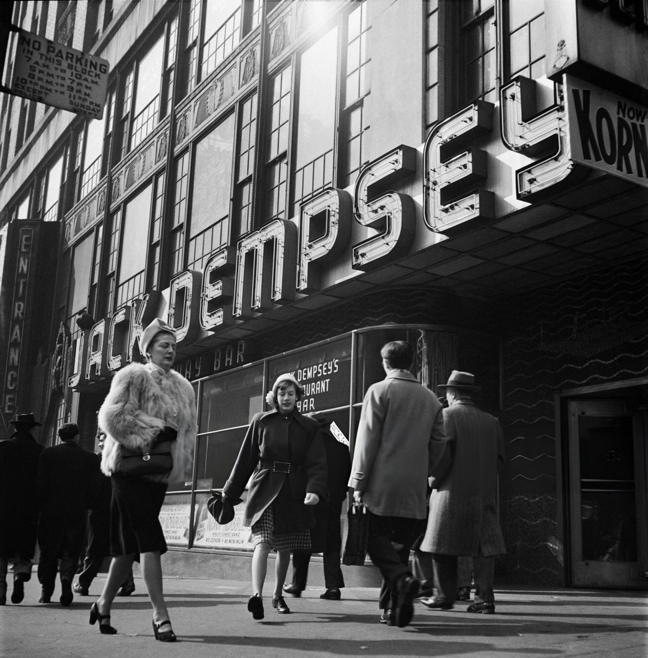 People Pass Jack Dempsey'S Restaurant, Owned By World Heavyweight Boxing Champion Jack Dempsey, 1947.