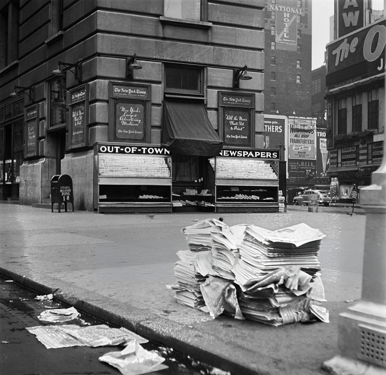 Unsold Newspapers Lie On The Pavement In Front Of The Former Headquarters Of The New York Times Newspaper, 1947.