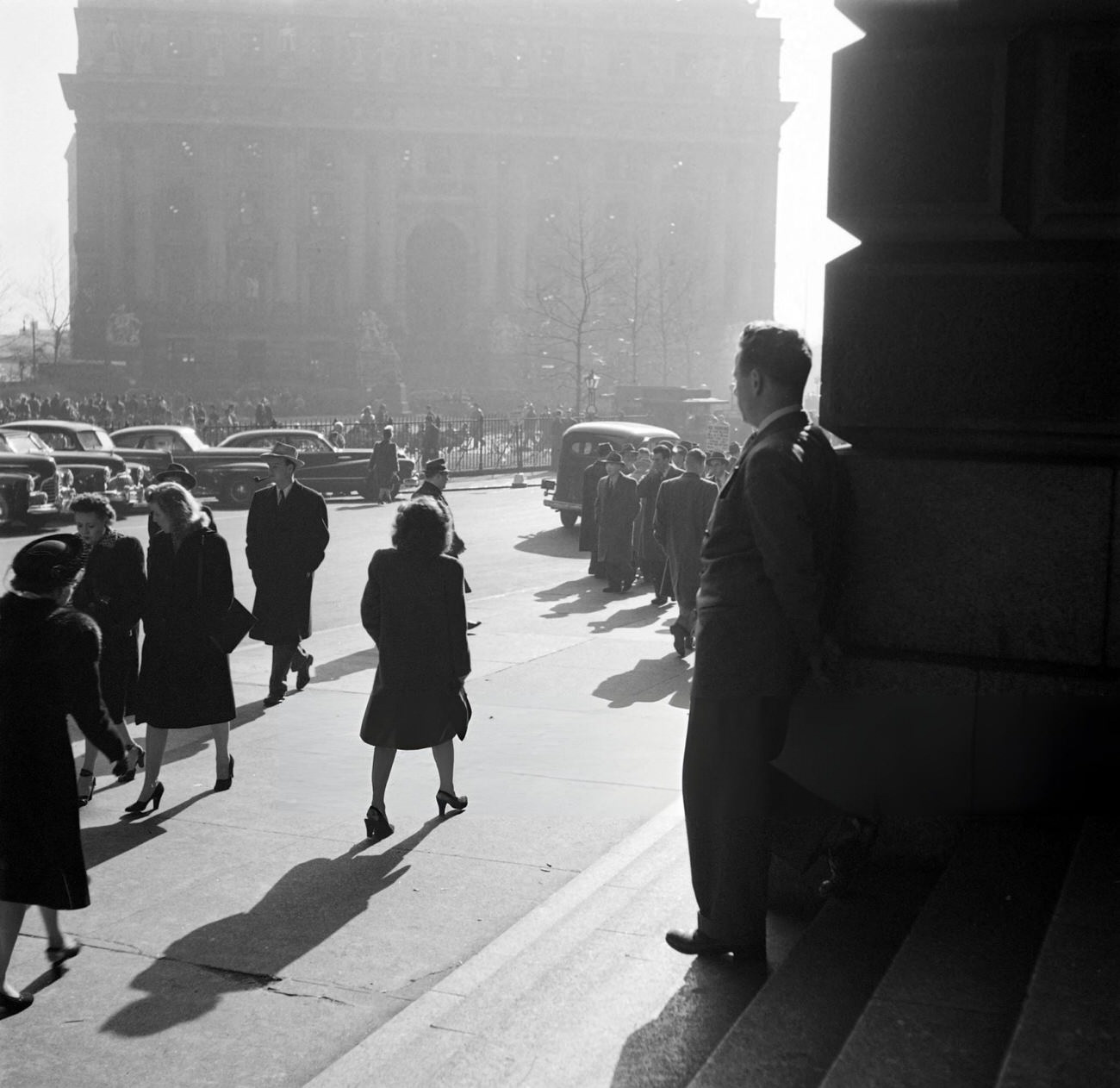 A Man Enjoys The Sun On The Stairs Of The Cunard Building On Broadway, 1947.