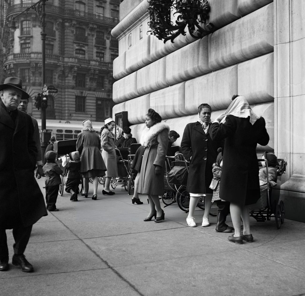 Nannies, Including Afro-American Women, Wait With Children In Baby Carriages, 1947.