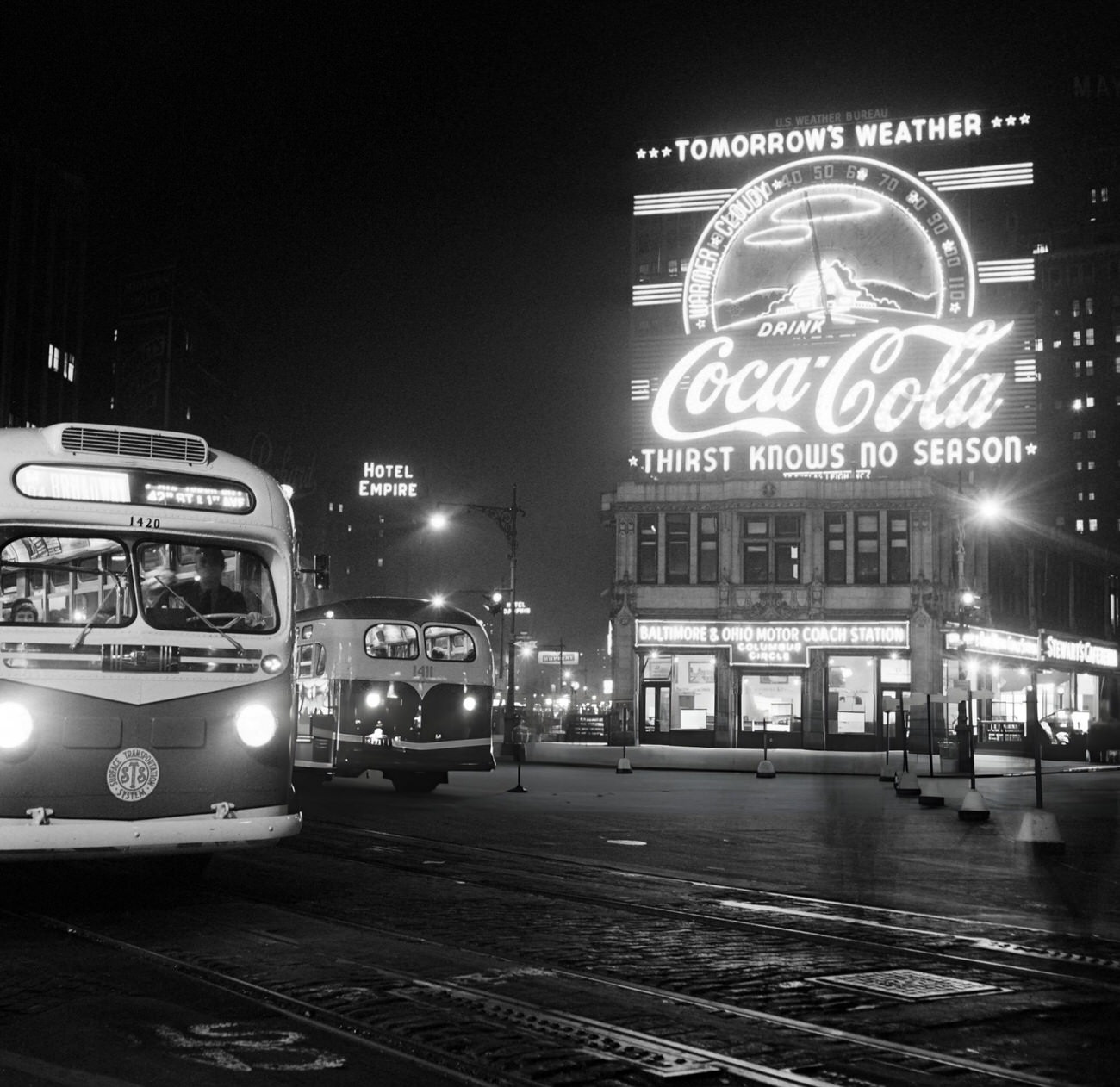 Buses Run At Night On Columbus Circle, 1947.