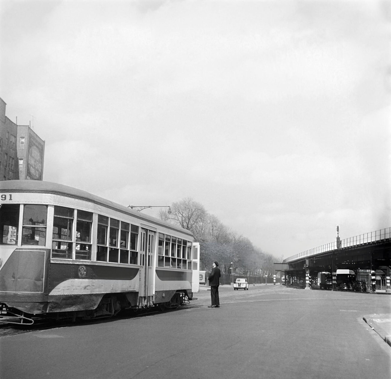 A Man Gets On A Tramway, Near The Ligne 1 Elevated Subway, 1947.