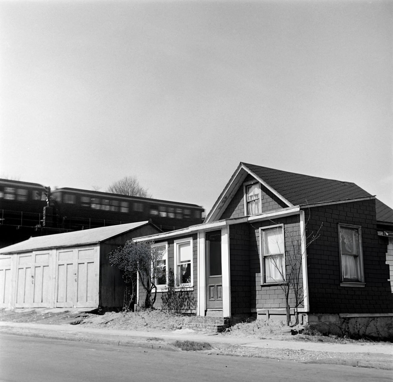 Houses Near The Ligne 1 Elevated Subway, On Broadway, 1947.