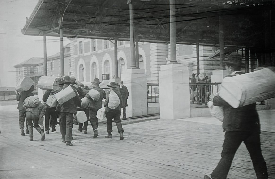 Immigrants Carrying Luggage, Ellis Island, New York