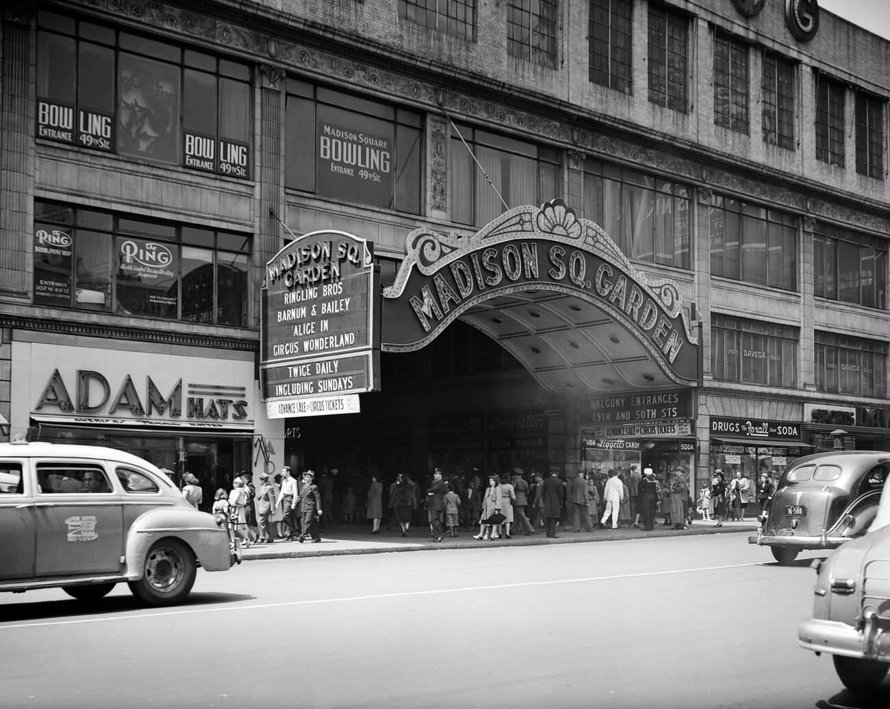 Pedestrians And Cars Passing The Marquee Of Madison Square Garden During A Circus Performance, 1940S.