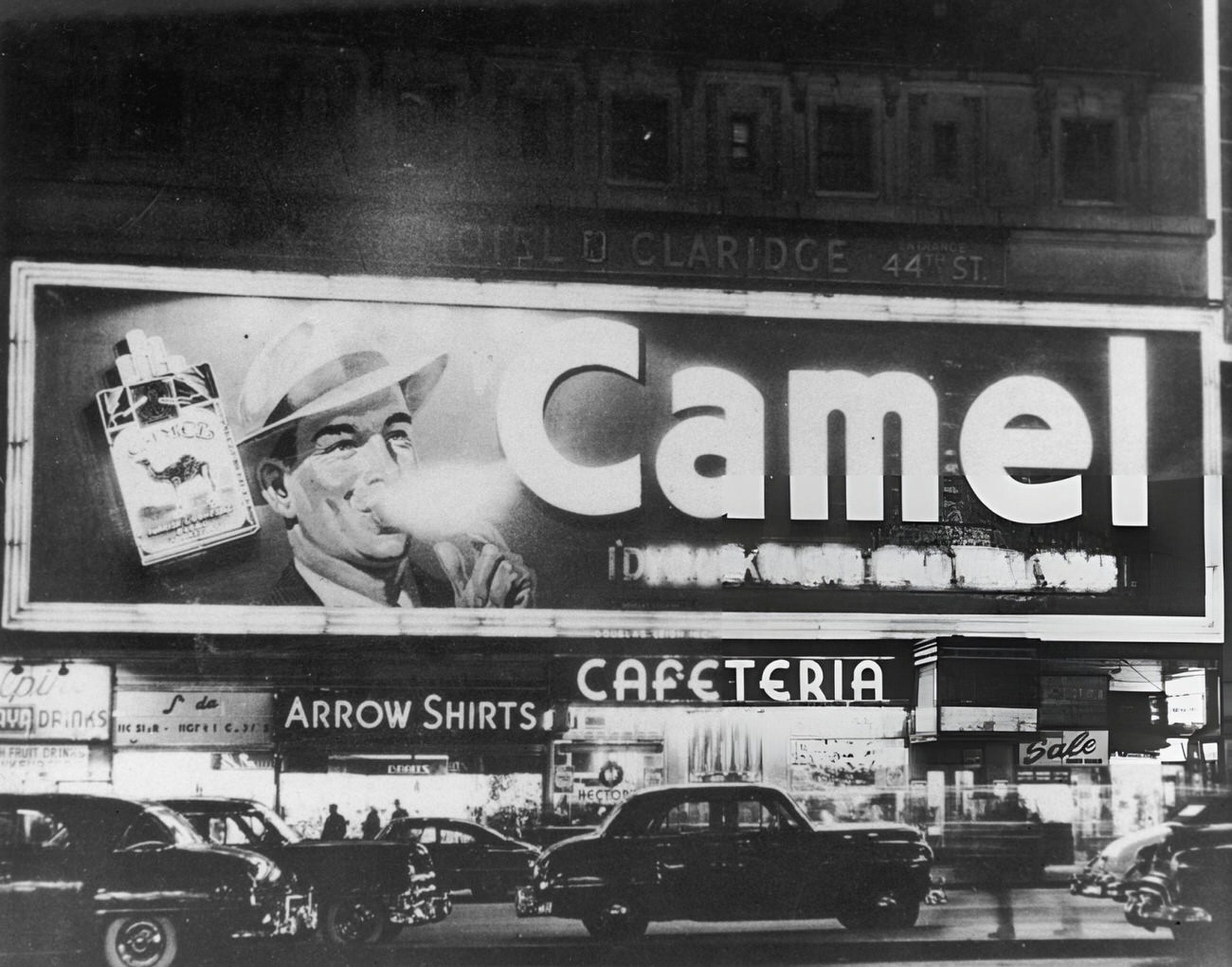 A Neon Billboard For Camel Cigarettes In Times Square, 1940S.