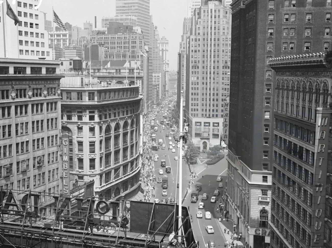 Traffic Passing Through Times Square In New York City, With Herald Square In The Background, 1940S.