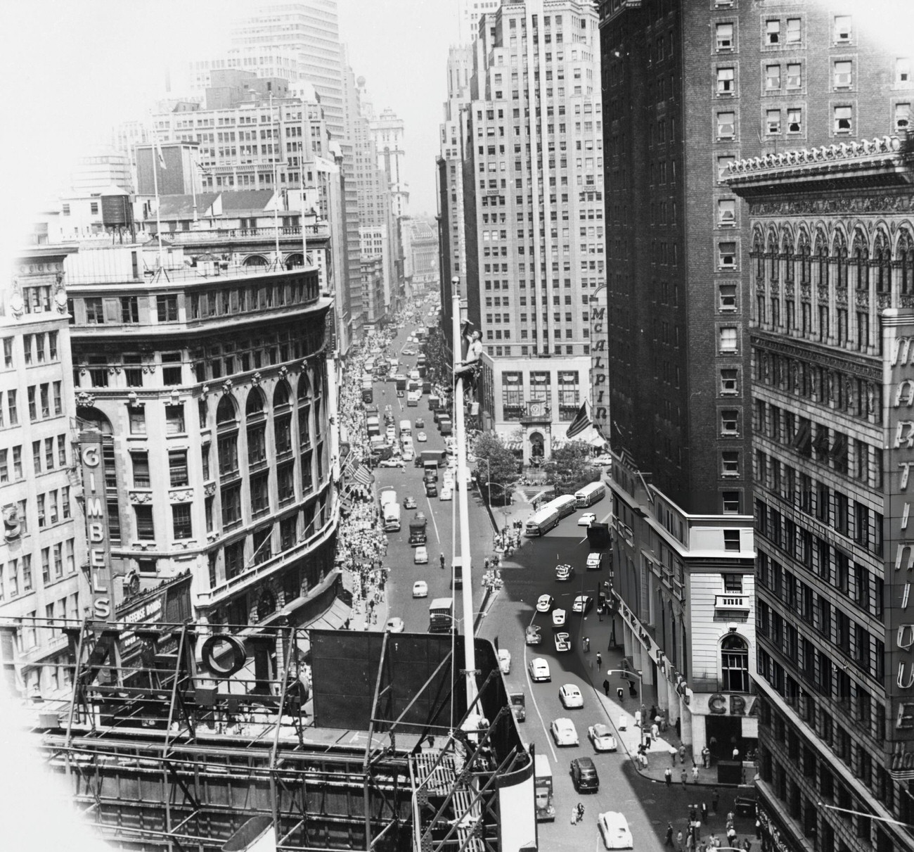 Traffic Passing Through Times Square In New York City, With Herald Square In The Background, 1940S.