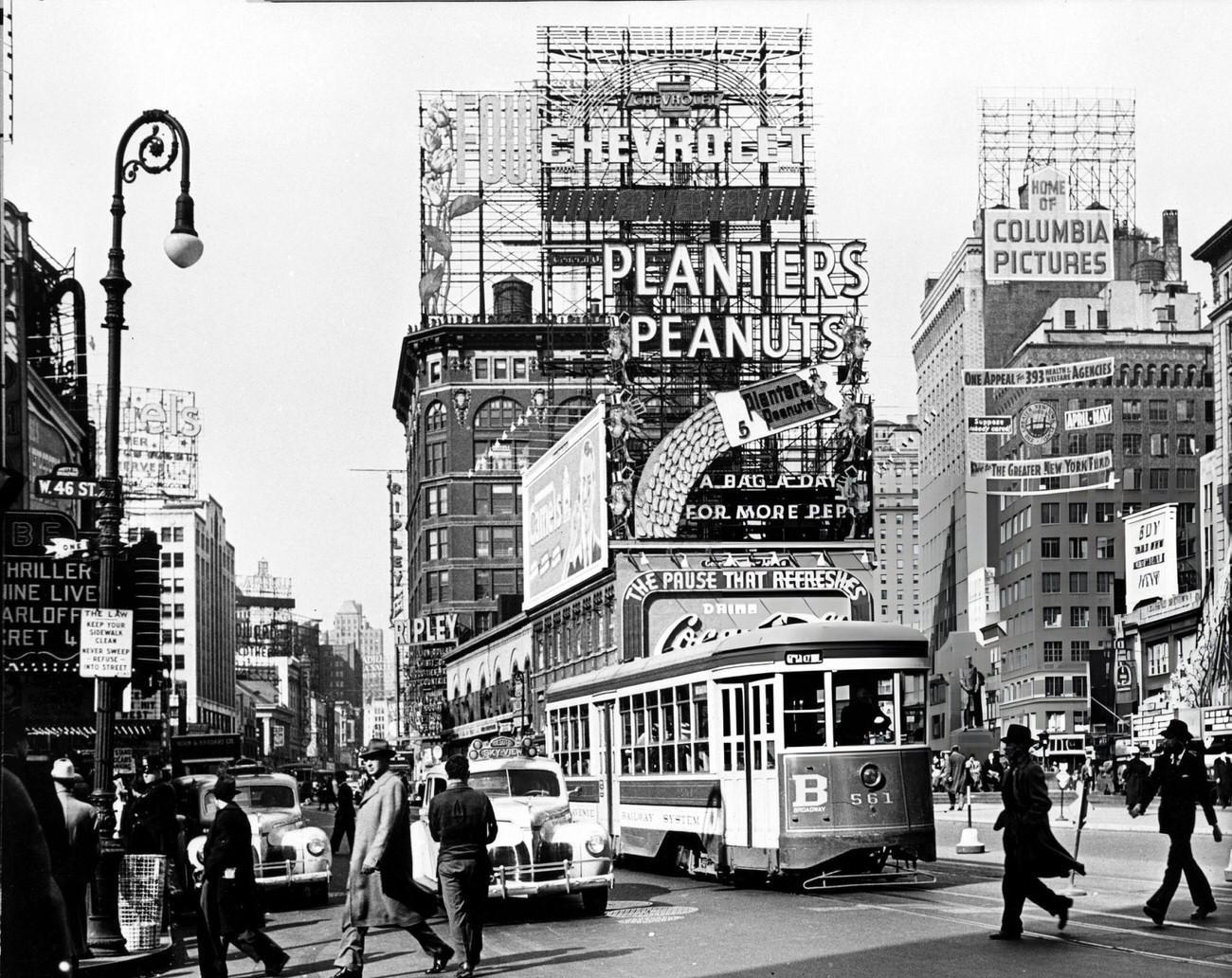 Pedestrian And Street Traffic In Times Square, 1940.