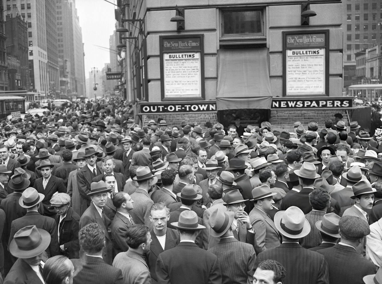 Times Square With Crowds Reading Bulletins As Italy Enters The War, 1940.