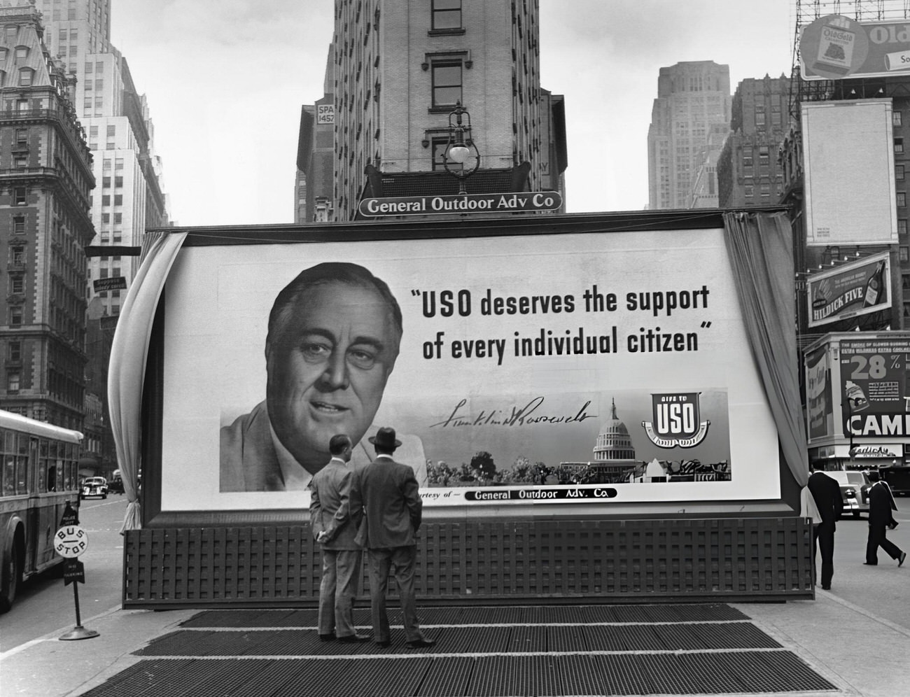 A Billboard In Times Square Featuring President Franklin Roosevelt Asking Americans To Support The Uso, 1940S.