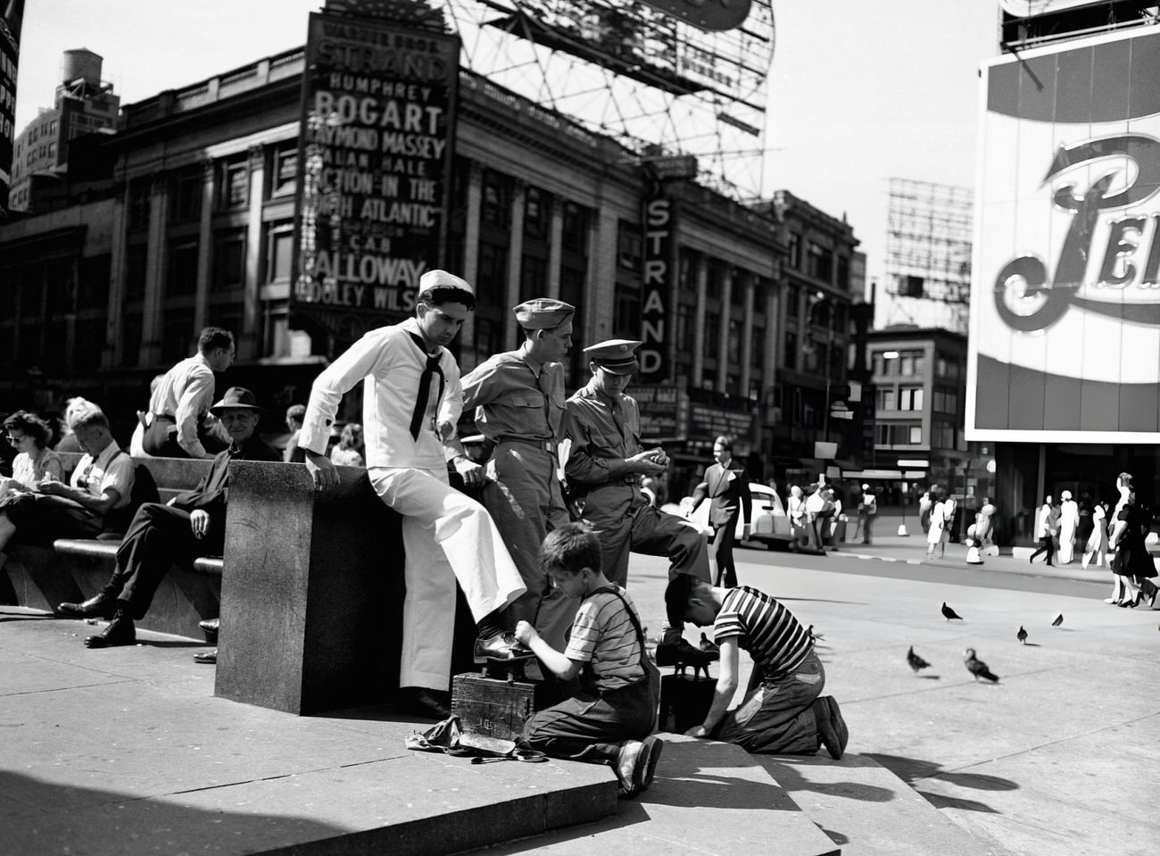 Children Shining Shoes Of Soldiers At Father Duffy'S Statue In Times Square, New York City, 1943.