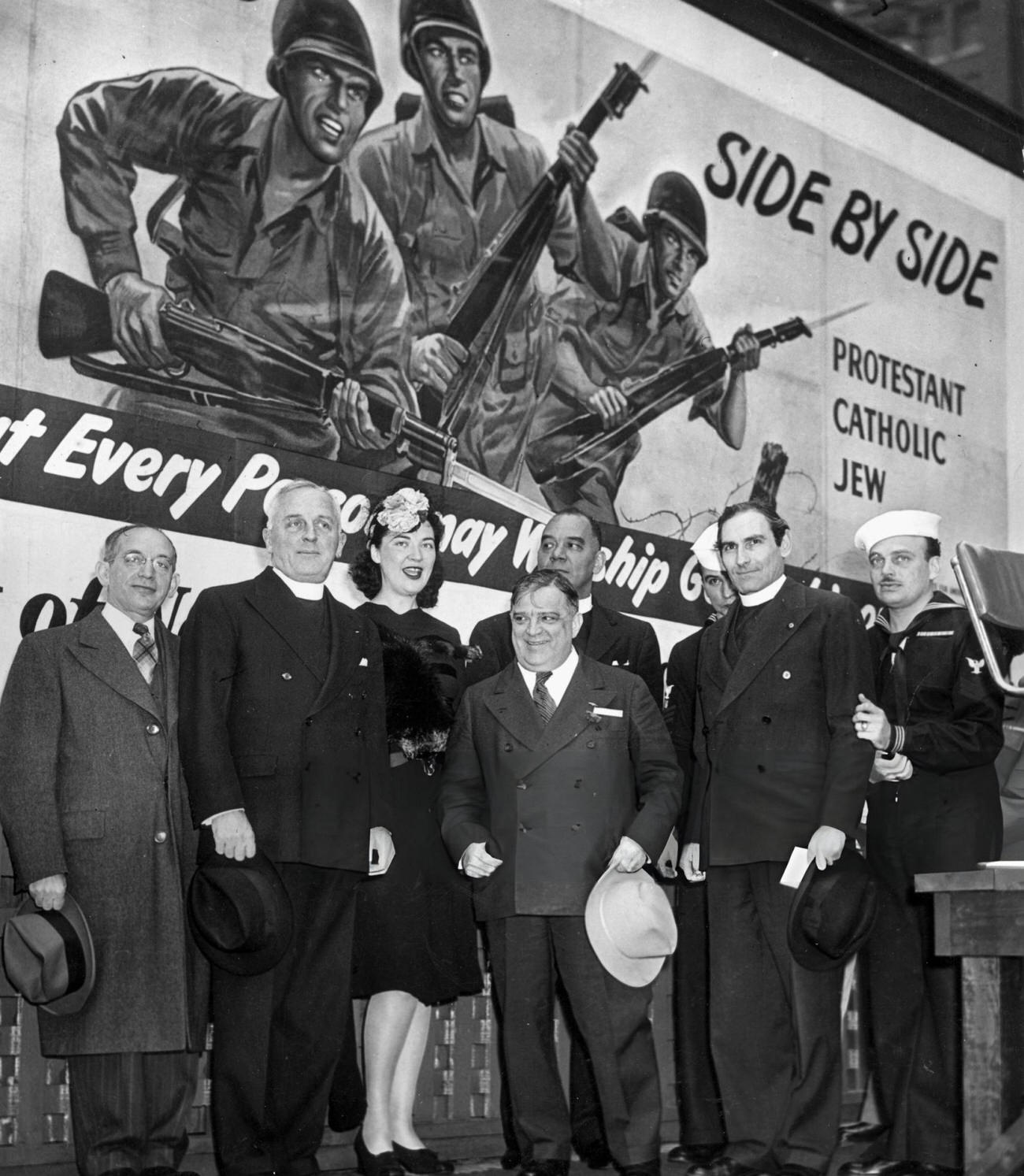 Mayor Fiorello La Guardia Posing With Religious Leaders In Front Of A World War Ii Religious Unity Poster In Times Square 1944.