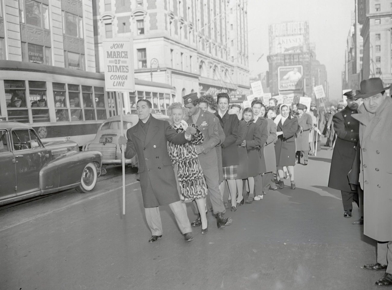 A Conga Line During A March Of Dimes Rally, Times Square, New York City, 1945.