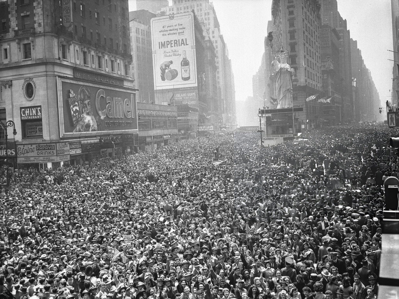 A General View Of Times Square Showing Surging Crowds Celebrating Germany'S Unconditional Surrender, 1945.