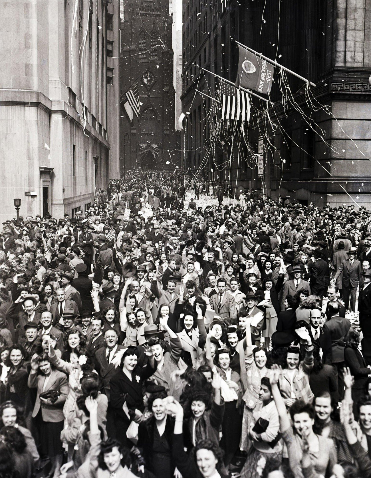 A V-E Day Crowd In The Wall Street Area Of New York City, 1945.