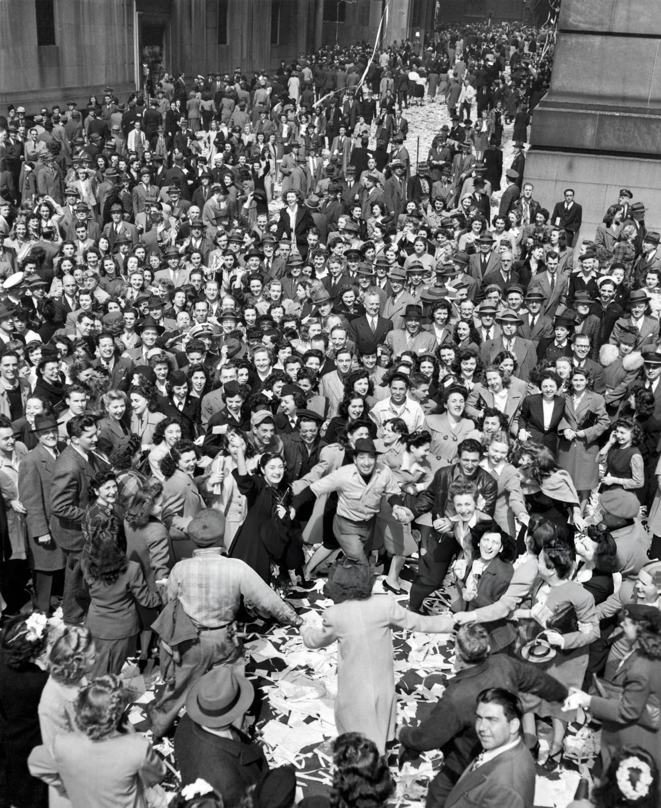 An Erroneous Associated Press Announcement Has New Yorkers Celebrating Ve-Day And Dancing On Wall Street, New York, 1945.