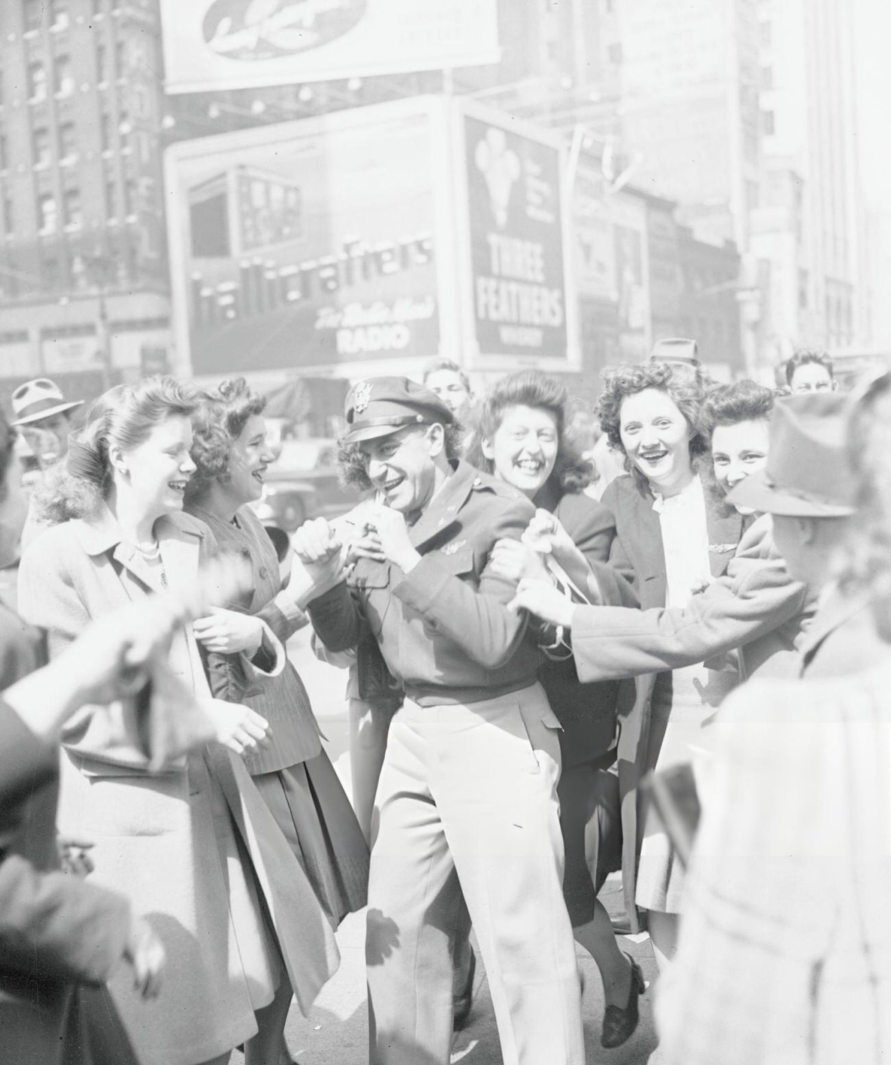 A Crowd Celebrating V-E Day In Times Square, New York City, 1945.