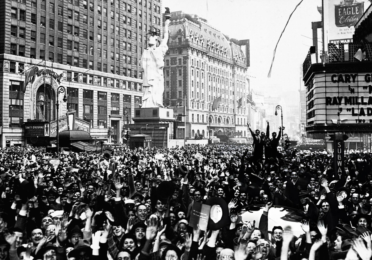 Thousands Celebrate The Unofficial Word Of Germany'S Unconditional Surrender In Times Square, New York City, 1945.