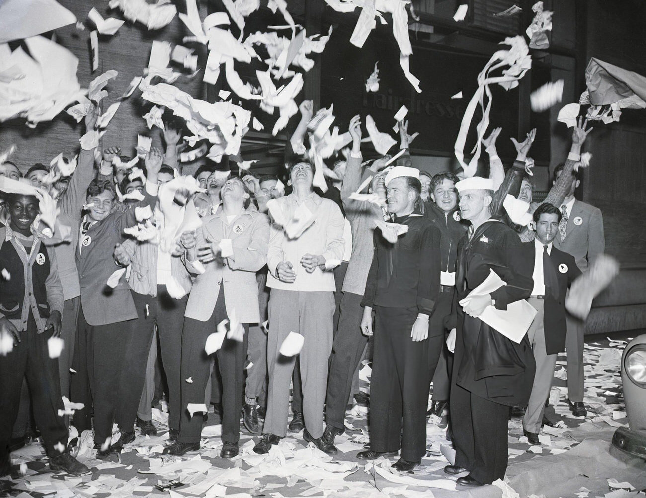 People Toss Ticker Tape In The Air During A V-E Day Celebration In New York, 1945.