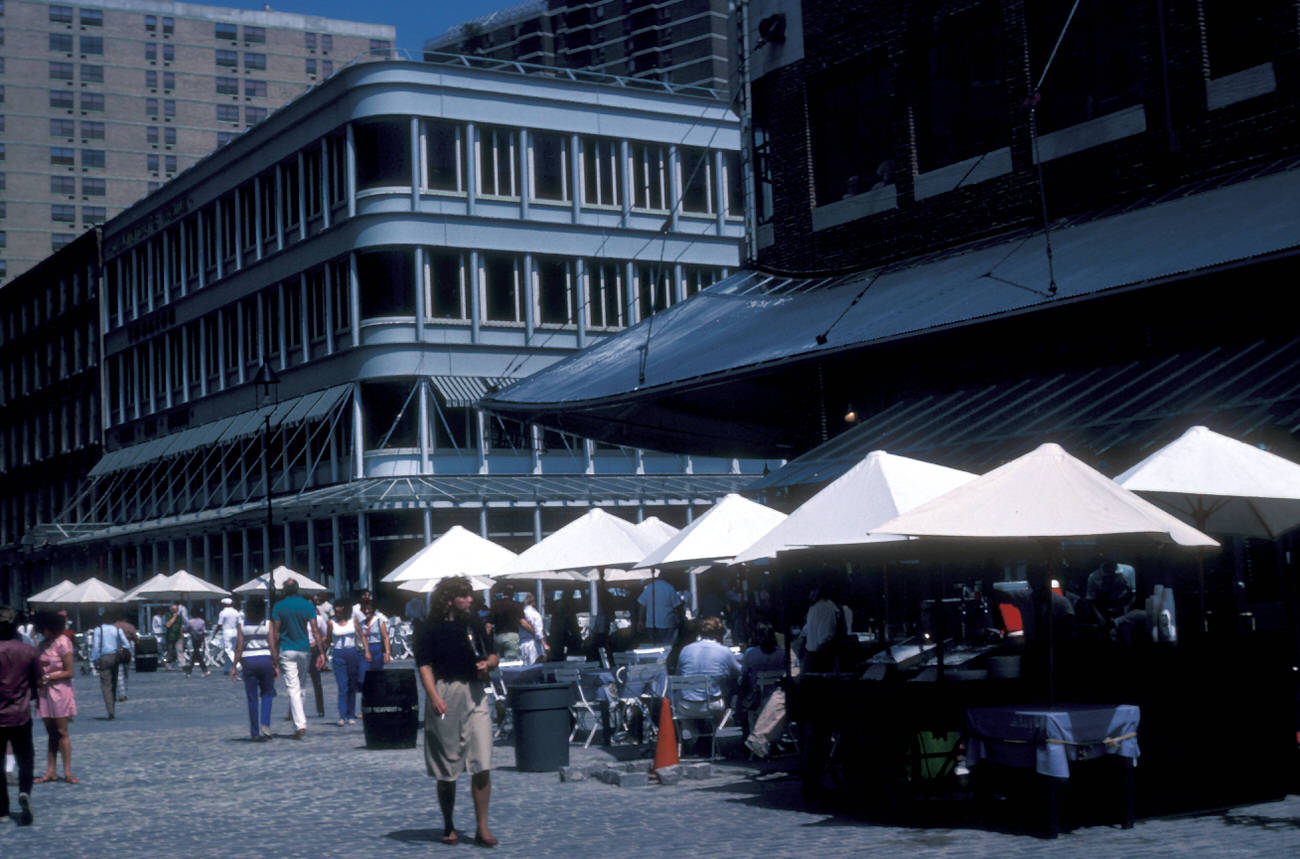 A Street Scene At The South Street Seaport And Fulton Market, 1983.