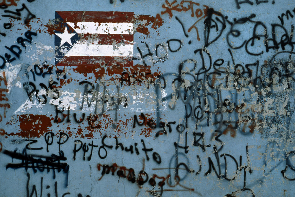 A Puerto Rican flag and graffiti, New York, 1978.