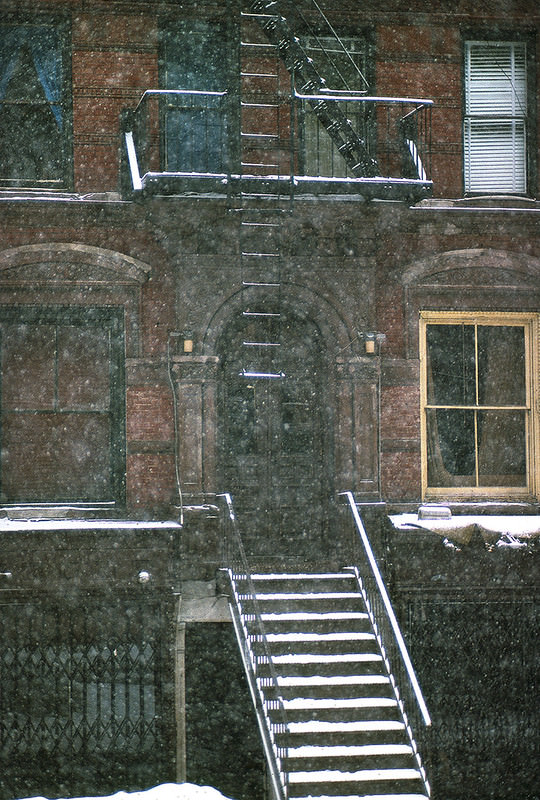 A snowy staircase, St. Mark's Place, Downtown Manhattan, 1977.