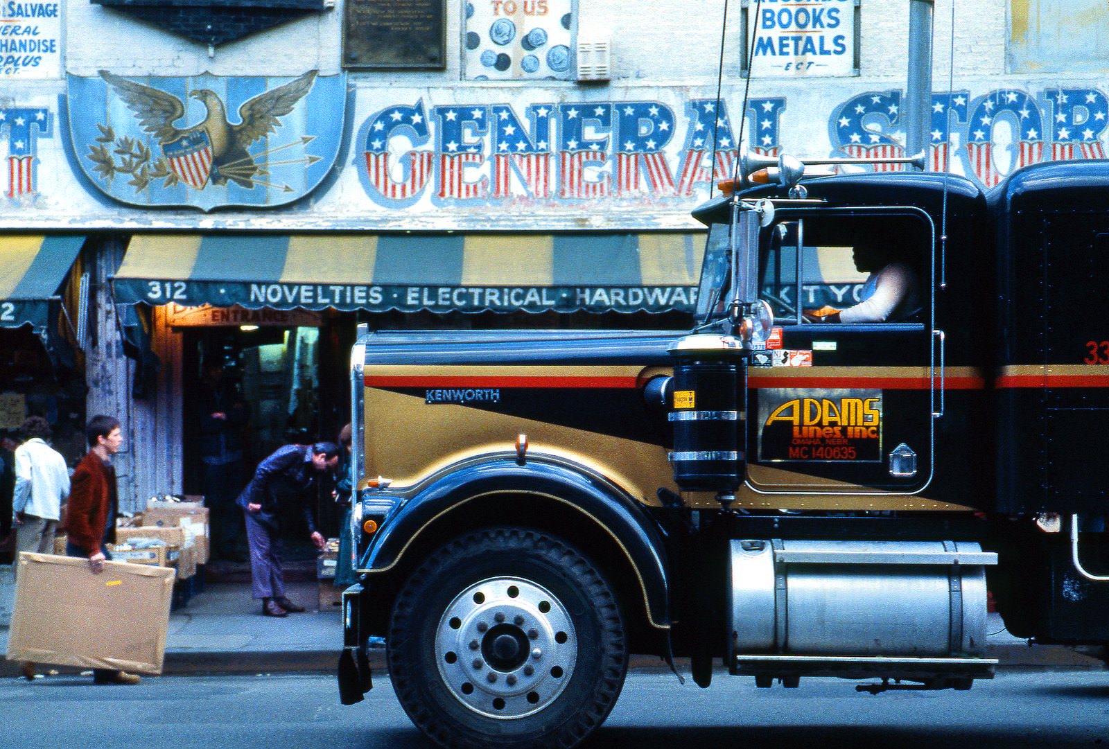 A Kenworth truck in front of the Canal Street General Store, 1978.