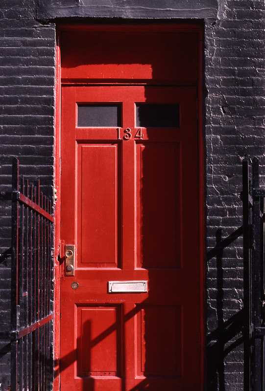 A red door on the Bowery, Manhattan, 1978.