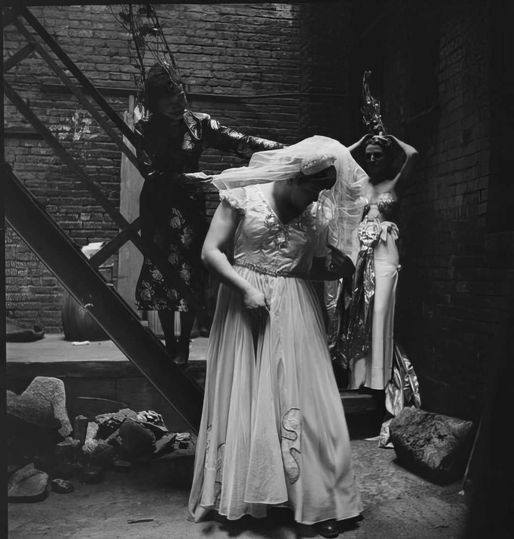 Costumed women, 1951.