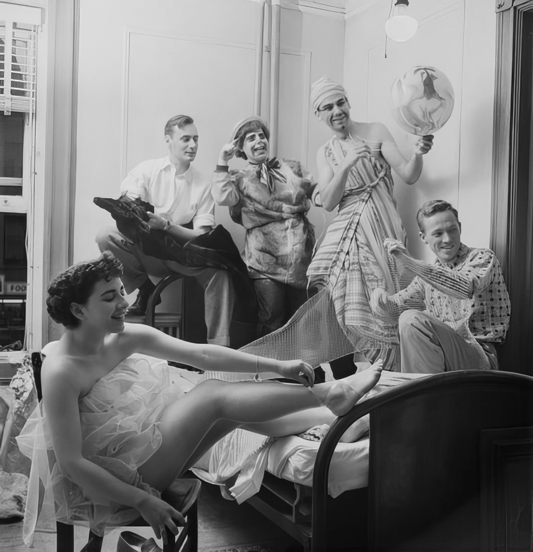 A group of people preparing for the ball, 1951.