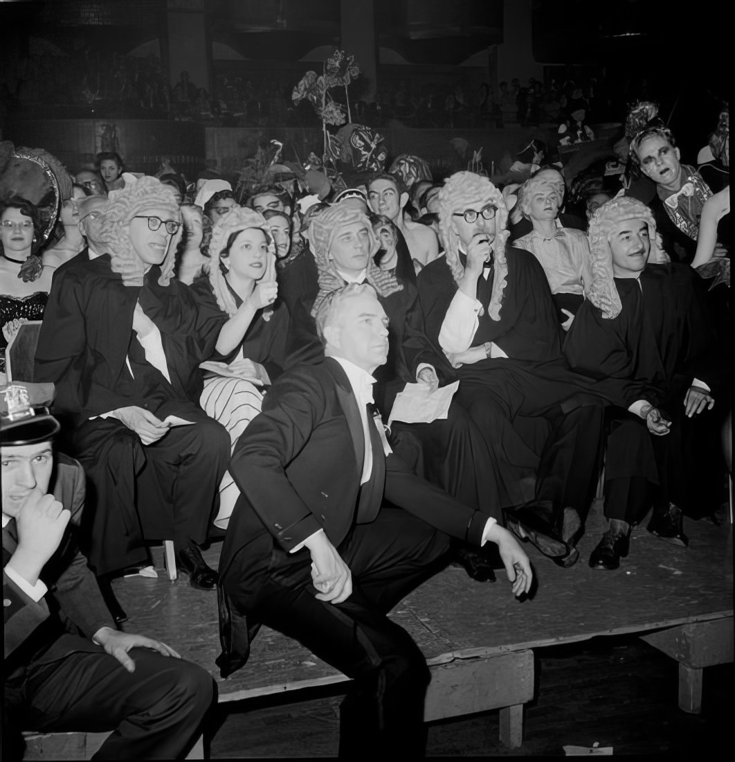 People dressed as judges on a stage, 1951.