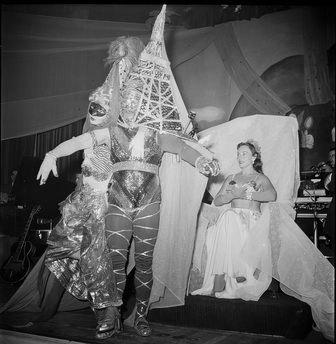 People in a costume on stage, 1951.