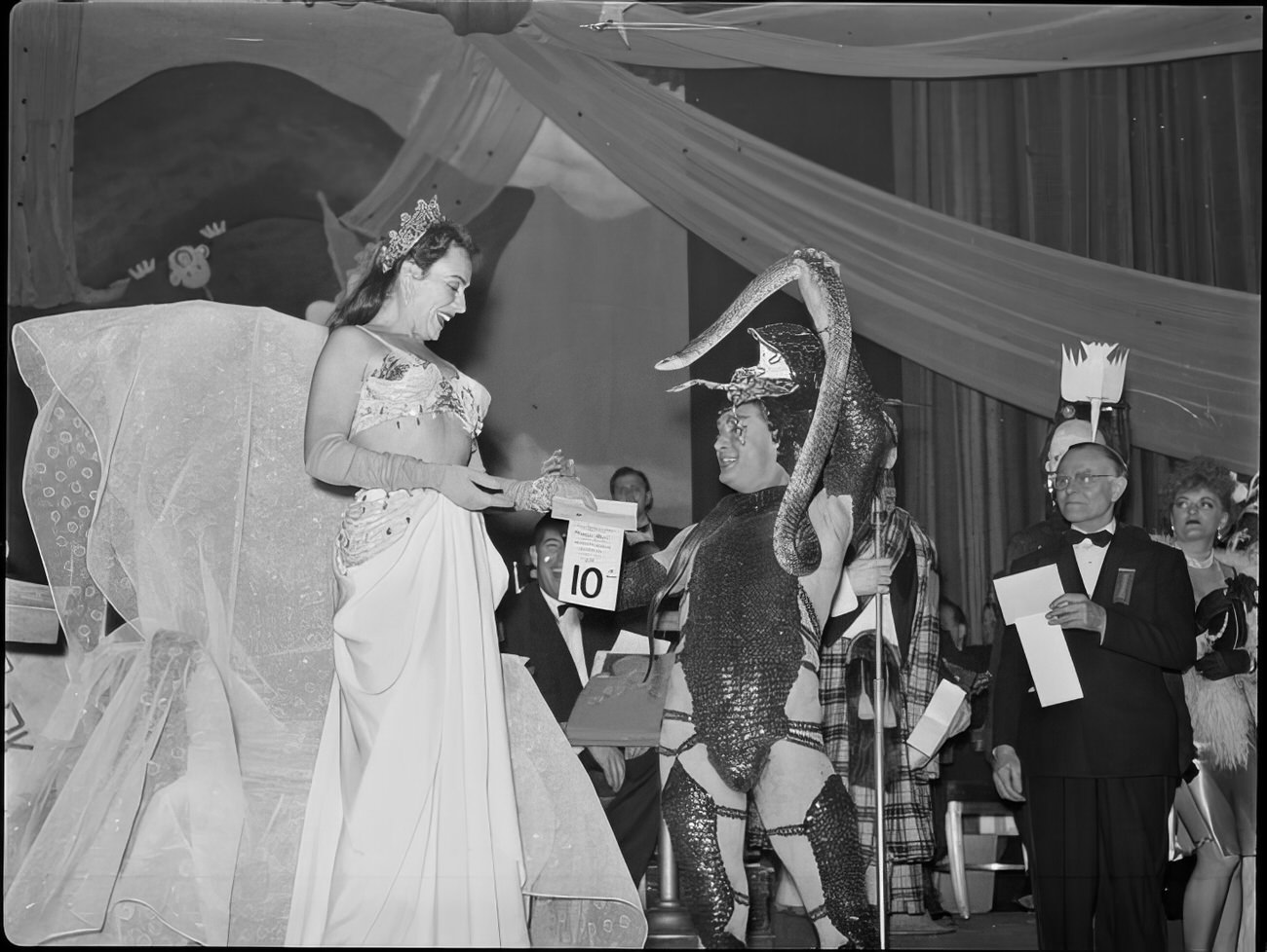 A woman receiving the 10th place prize for best costume, 1951.