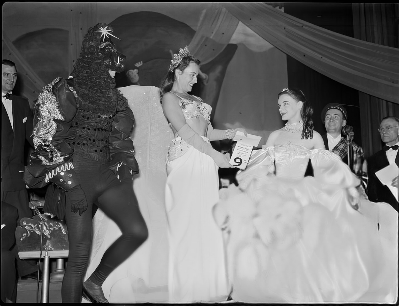 A woman receiving the 9th place prize for best costume, 1951.