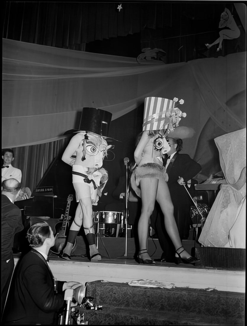 A man and a woman on stage in costumes, 1951.