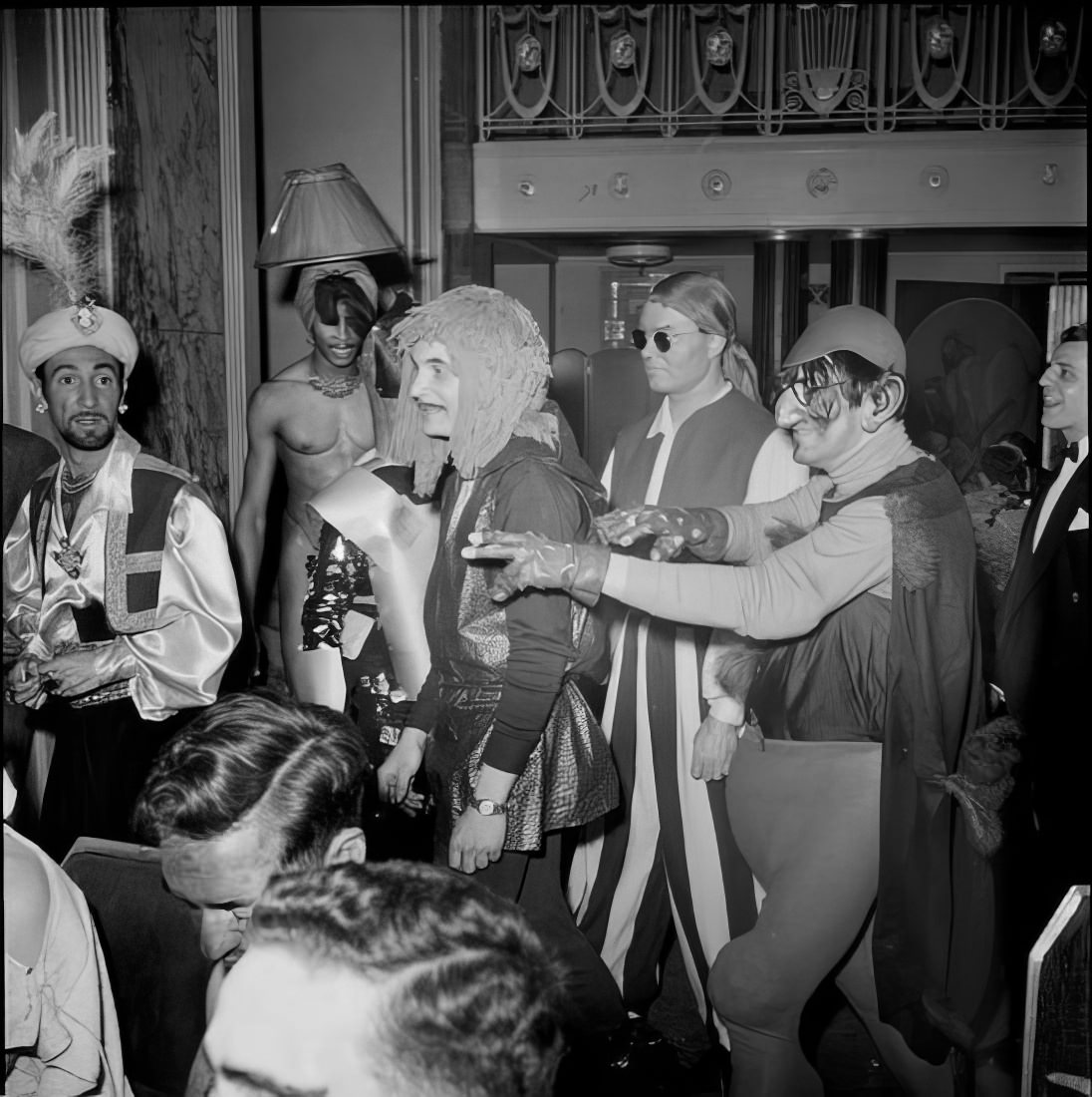 Guests at a costumed ball, 1951.