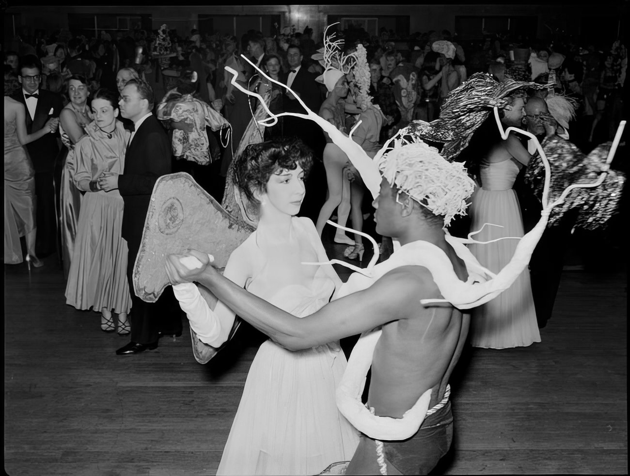 People in costume dancing, 1951.