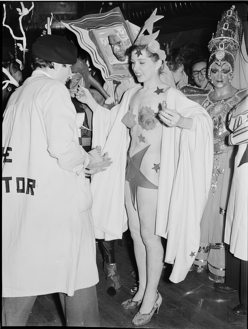 People in elaborate costumes, 1951.