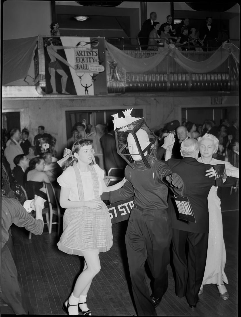 A costumed couple dancing, 1951.