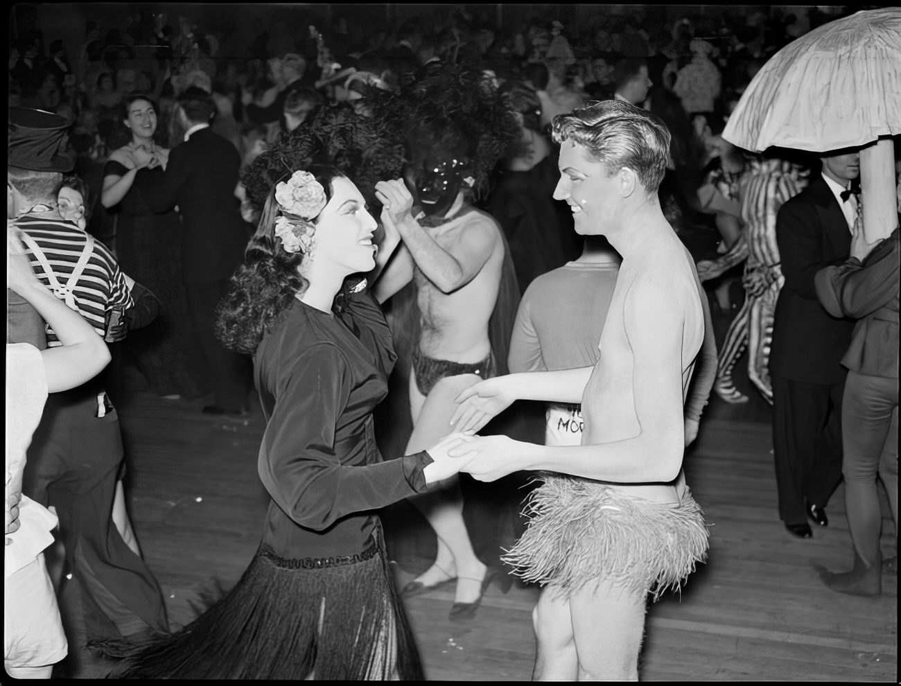 A costumed couple dancing, 1951.