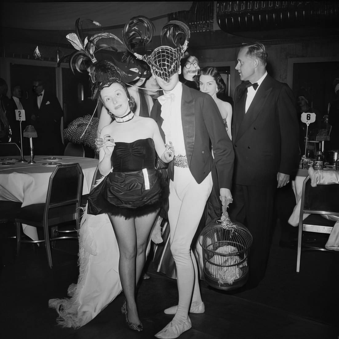 Ball guests in elaborate costumes, 1951.