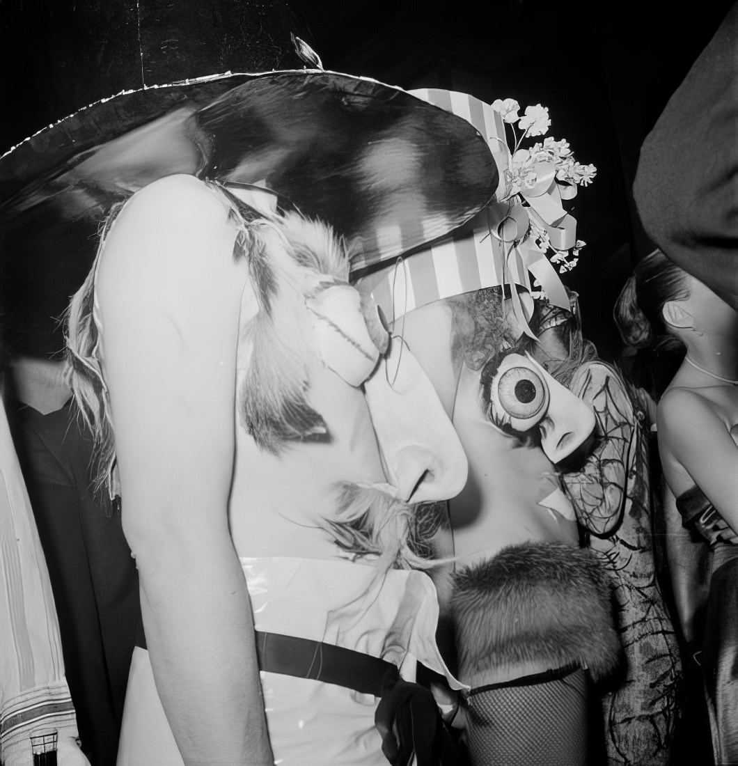 Ball guests in elaborate costumes, 1951.