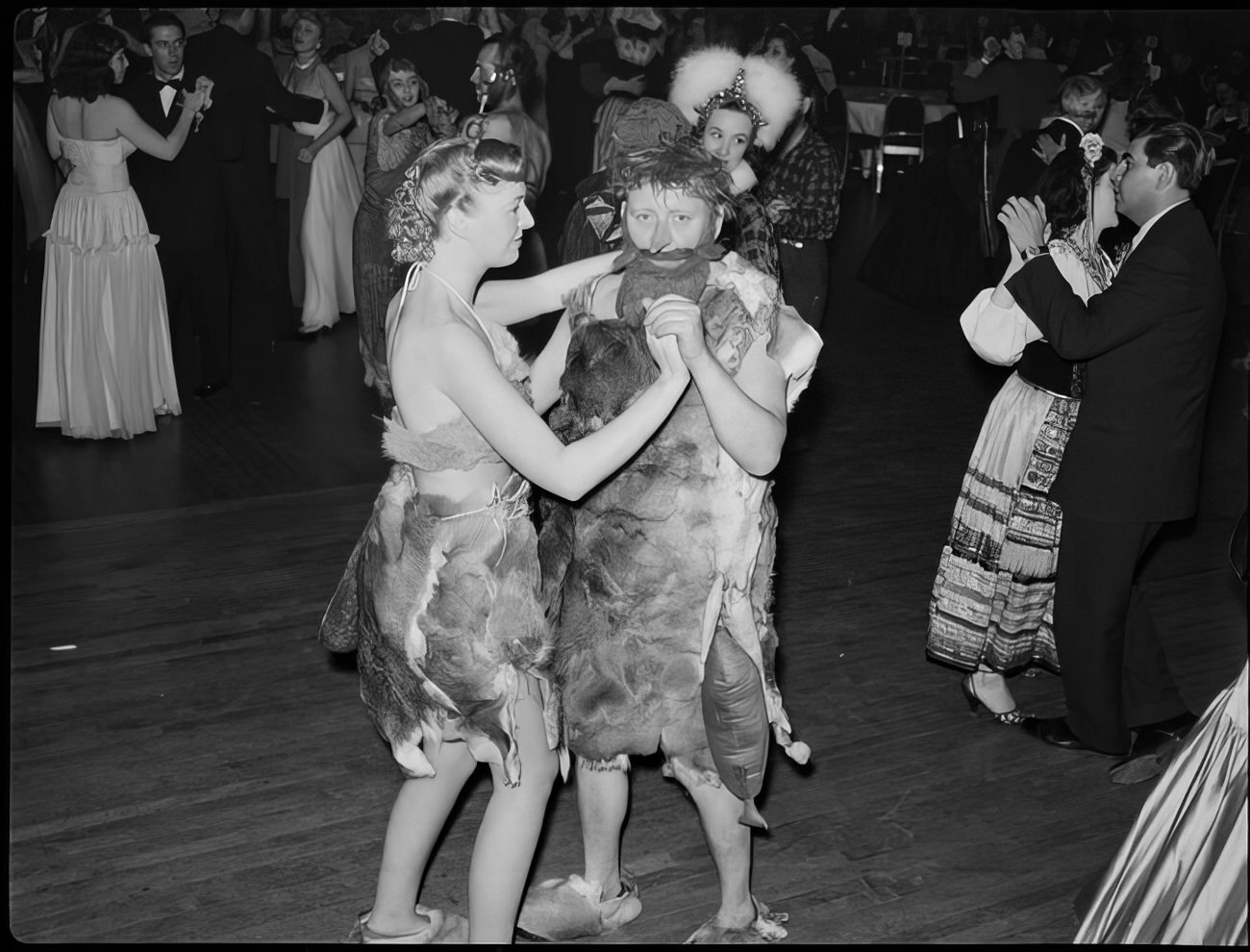 A costumed couple dancing, 1951.