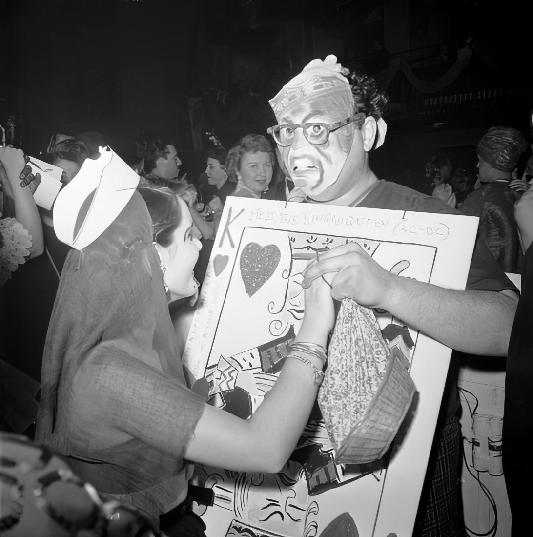 A costumed couple dancing, 1951.